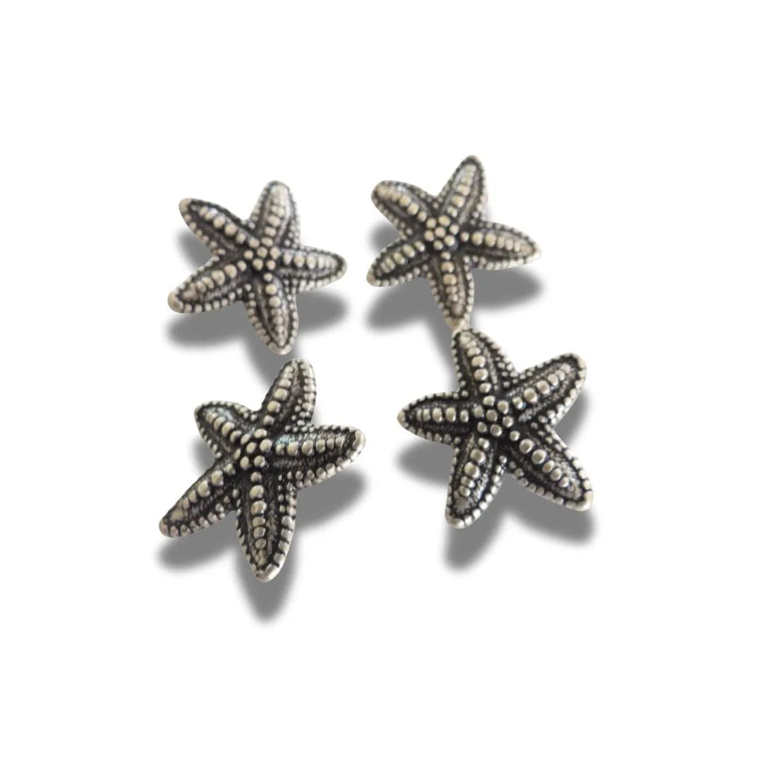 Set of 4 starfish-shaped buttons