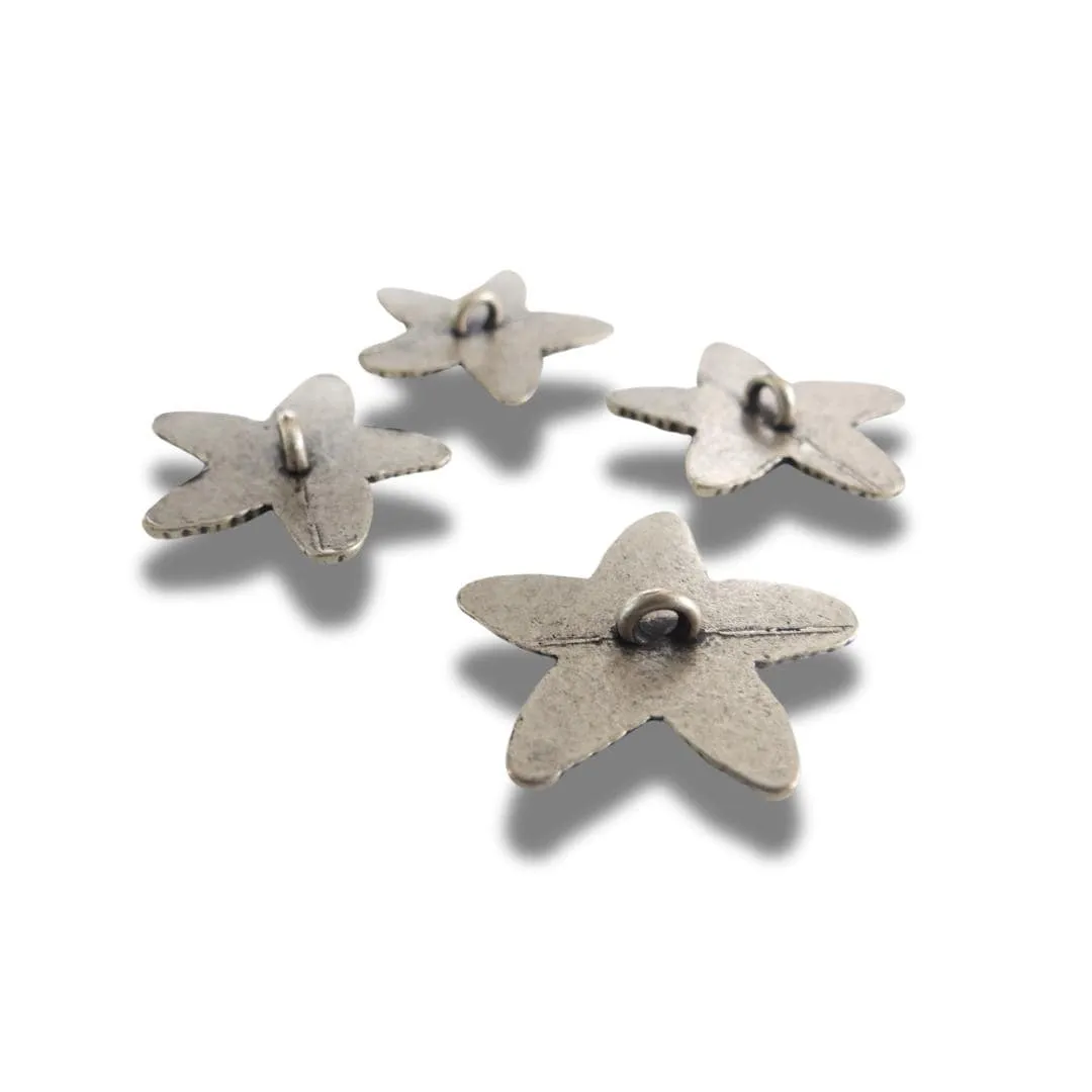 Set of 4 starfish-shaped buttons
