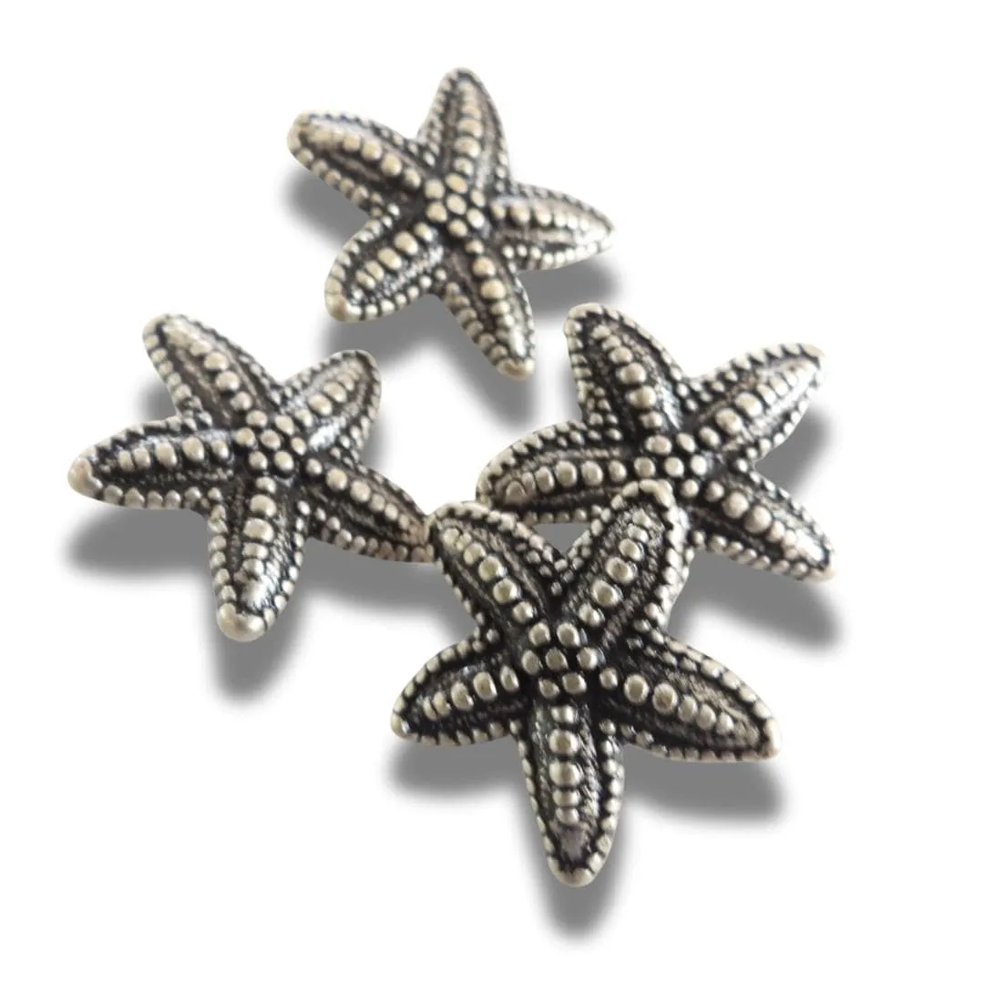 Set of 4 starfish-shaped buttons