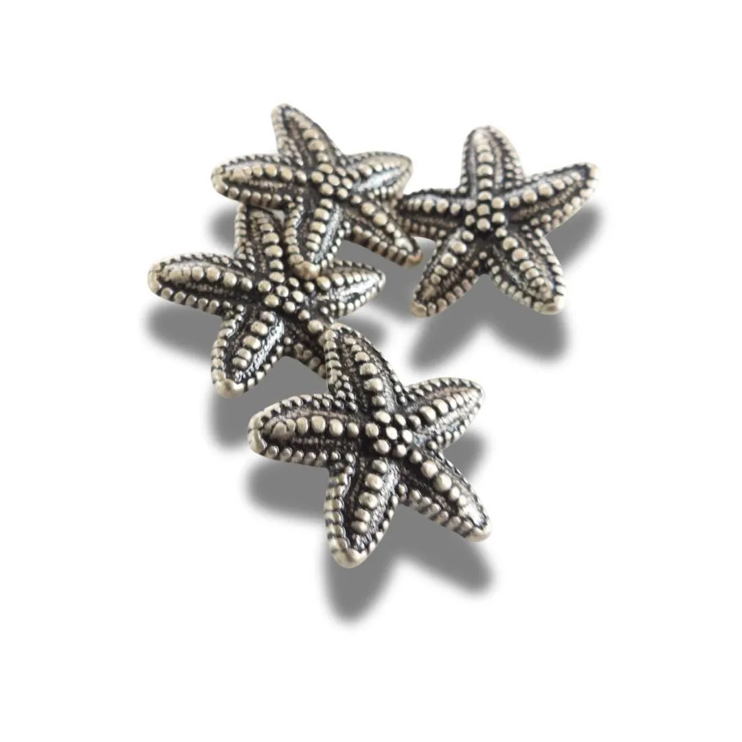 Set of 4 starfish-shaped buttons