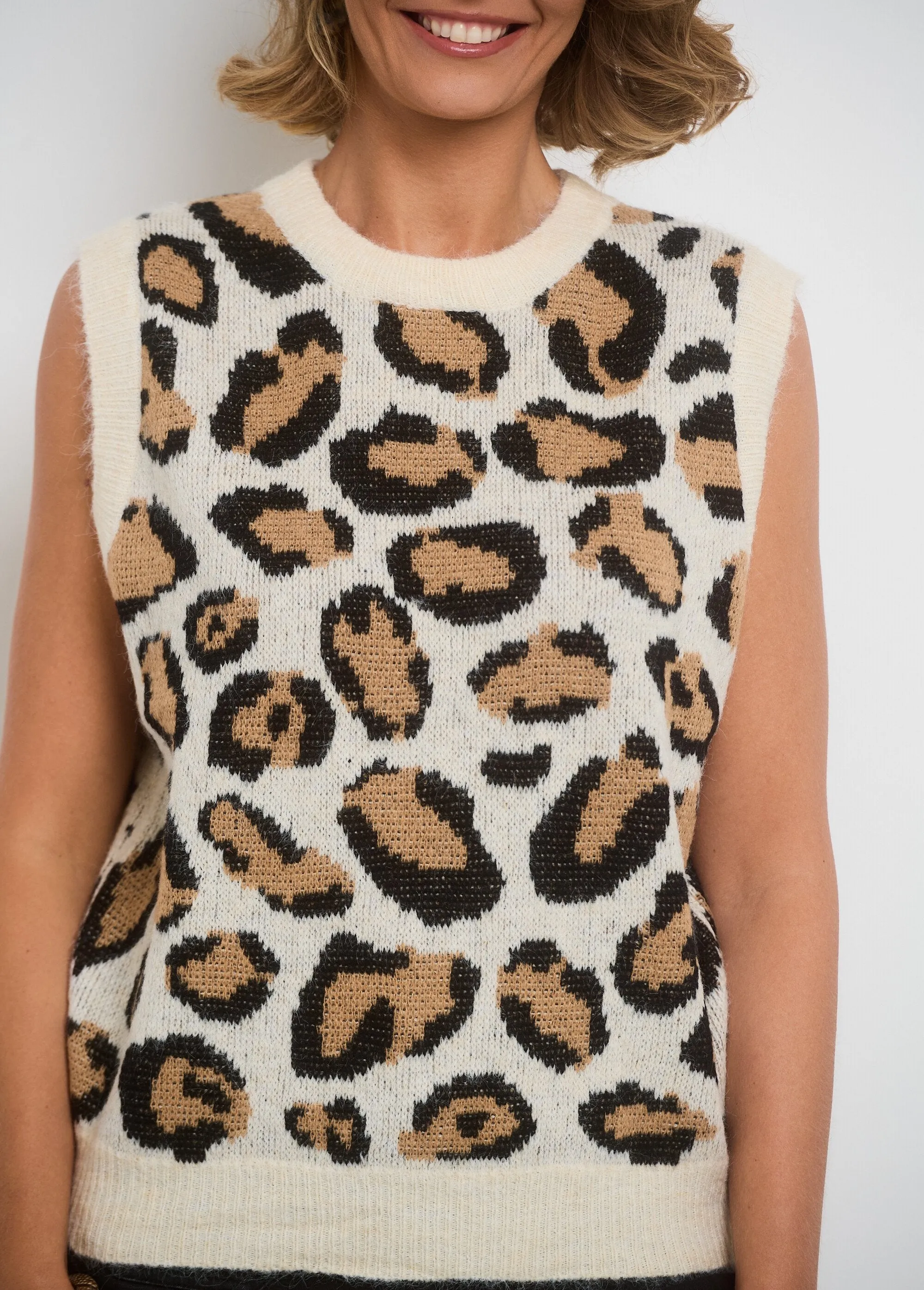 Warm sleeveless knitted sweater