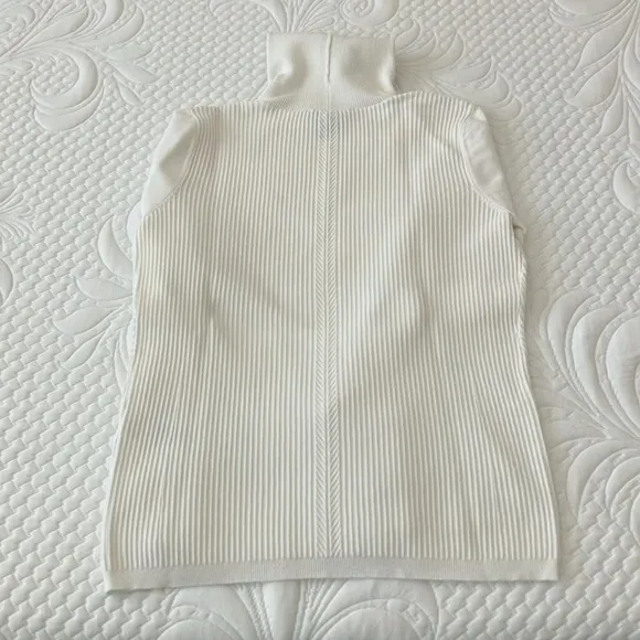WHBM white turtleneck textured sweater with gold zipper detail on sleeves